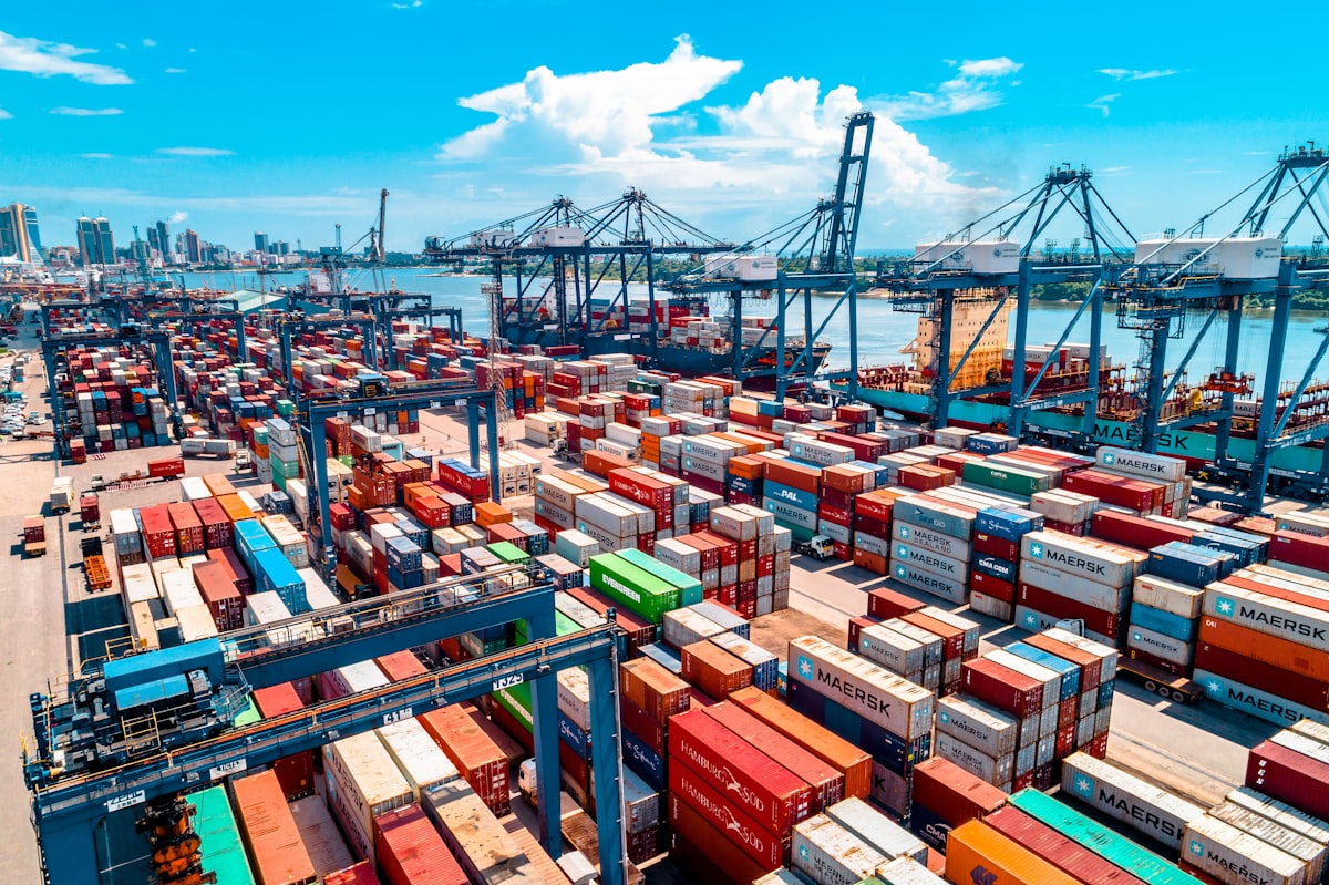 Stacked shipping containers at a distribution warehouse